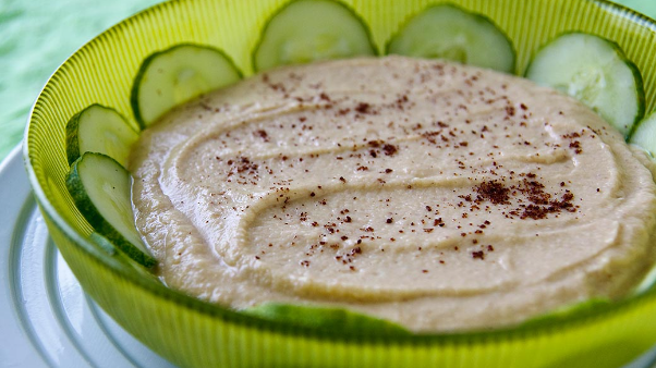 Cucumber slices with hummus